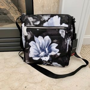 Limited Edition Tumi Voyager Crossbody. Never Used